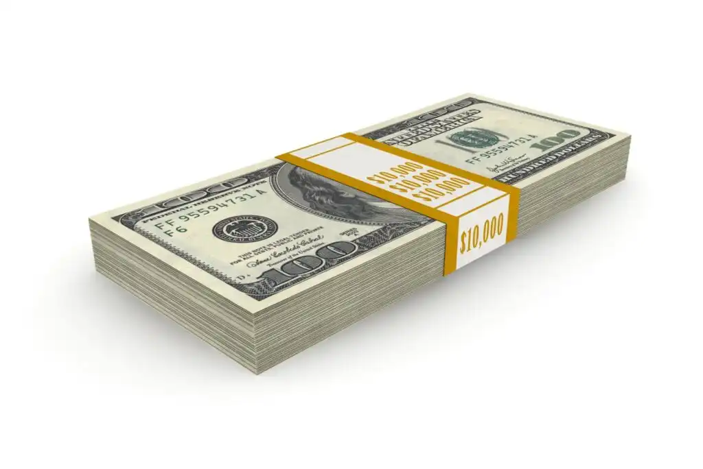 A stack of U.S. one hundred dollar bills bound with a yellow paper band labeled $10,000 on a white background.