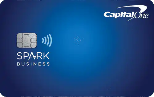 A blue Capital One credit card with a chip and contactless symbol, labeled Spark Business, featuring the Capital One logo in the top right corner.