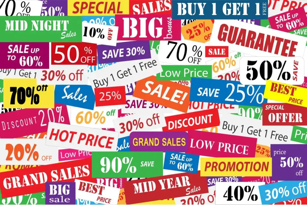 A colorful collage of various sale signs with phrases like 50% off, BIG SALE, Buy 1 Get 1, 90% off, SALE, LOW PRICE, and GUARANTEE in different fonts and colors.