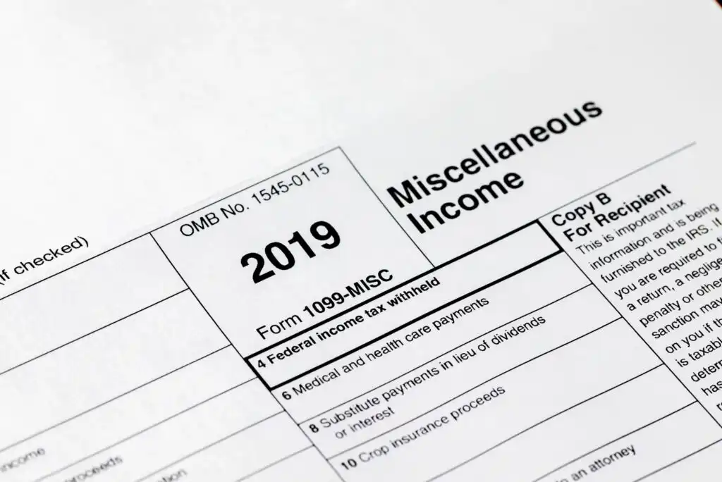 A close-up of a 2019 IRS Form 1099-MISC, titled Miscellaneous Income, showing form details and sections for reporting various types of income.