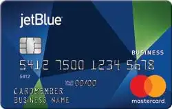 A JetBlue Business Mastercard credit card featuring a geometric blue and green design, an embedded chip, card number, and the Mastercard logo in the bottom right corner.