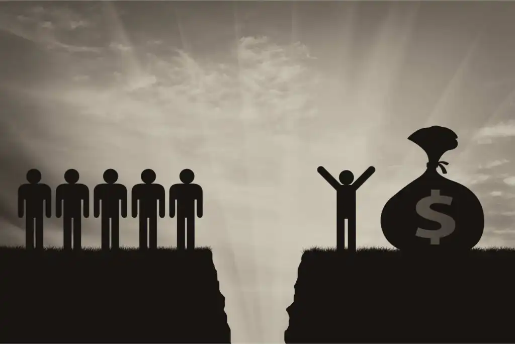 Silhouettes of five people stand on a cliff edge, separated by a gap from a single person raising their arms next to a large money bag with a dollar sign. Sunlight shines through a cloudy sky in the background.