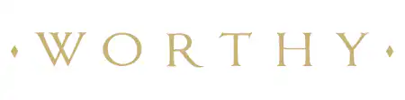 The word WORTHY is written in elegant, gold uppercase letters with a small diamond shape on each side. The background is white.